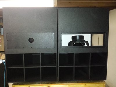 Mouth side of the cabs, one with the front door removed.