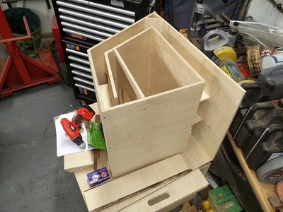 You can see the assortment of parts ready for installation, and the end of panel 10's handles just showing