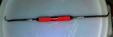 Also this very helpful tool from Parts Express sure does pick at the few buyers of latex caulk that might be in the hex heads . Only three on my part , and the buyers came off in one piece , maybe because of the grease WD40.