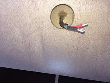 Wires routed and sealed from the driver chamber.