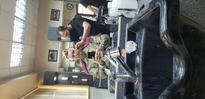 This is what I'd call a real barber. Can't beat a straight razor to the head. Haha