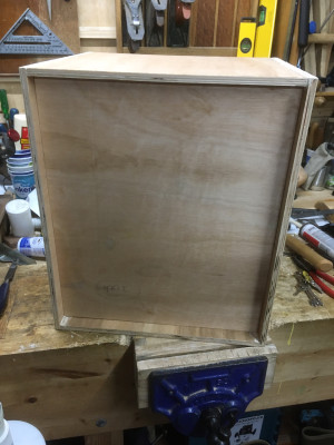 Cab with rough fit baffle