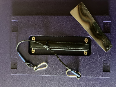 Amp board in place showing saw blade lamp platform