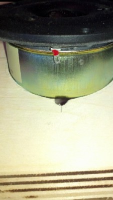 I drilled to holes for clearance for the extruded contacts on the tweeter prior to making the hole cut.