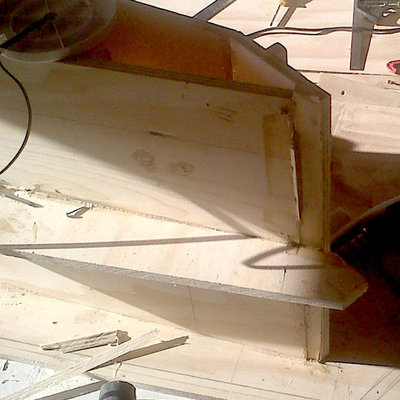 The wedge PL-ed into place with the extras to be sanded down after everything sets.