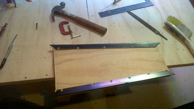 3/8 of the metal contacts the drive access panel and is sealed with pl so accuracy is the key.