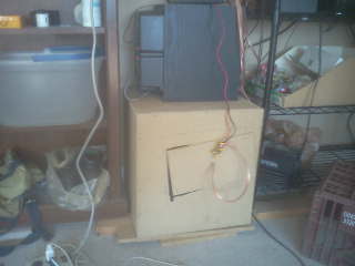 a shot of my old sub chillin on top of my T18. That 8inch dayton murders my 10inch sony.