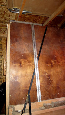 The greatest tool we every bought, a dry wall square. It seems no matter how good we think were are and with all the double checking of measurements, my cousin and I were never able to make 90 degree cuts on the inside panels. This helped us with that.