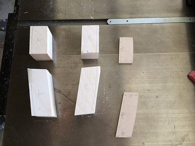 All the pieces angled cut and radius line drawn. Rough cut close to radius line.