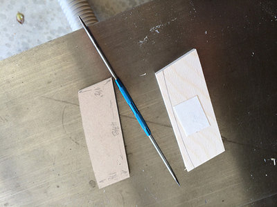 Using double-sided carpet tape to attach the template to each piece.