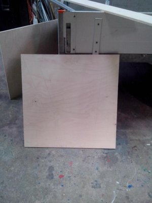 second side with layout from first panel transferred via drilled holes through both panels